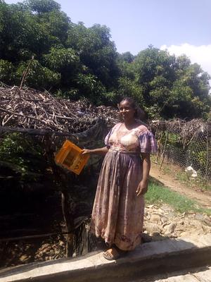 Haregu with one of the magazines that published her success story.